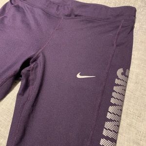 Purple Nike Dri-Fit running leggings